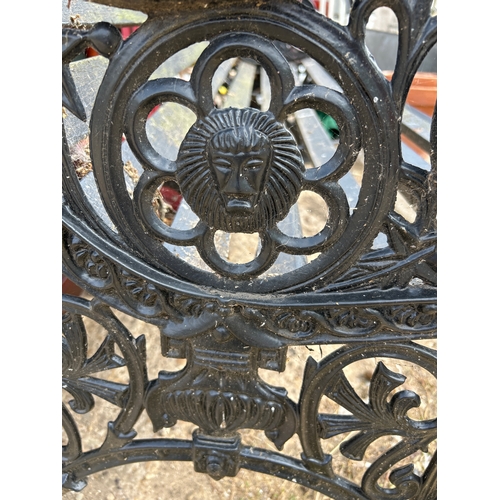 388 - VICTORIAN STYLE GARDEN BENCH WITH CAST METAL ENDS AND TWO SUPPORTING STRAPS -CLASSIC DESIGN WITH LIO... 