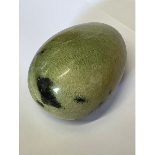 1 - A CARVED EGG OF CHYTHA SERPENTINE STONE FROM SOUTH AFRICA