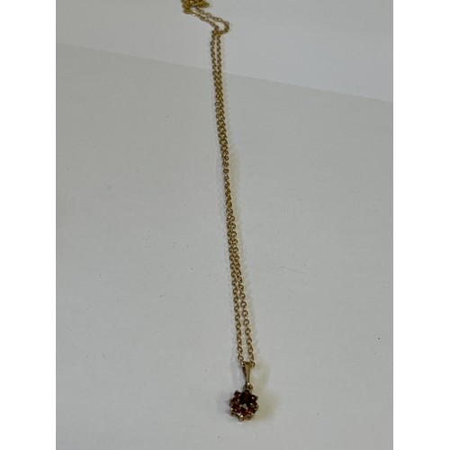10 - a 9ct gold 16 inch chain with 9ct gold pendant including garnets weight 2.41 gr