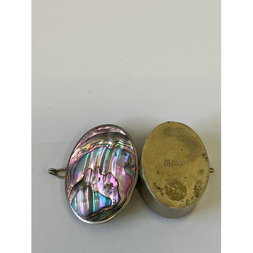 21 - A SOLID SILVER PILL BOX WITH A LID OF MOTHER OF PEARL WEIGHT 12.92GR