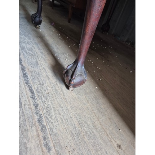 375 - 1920'S wind out dining table on ball and claw feet (missing centre leaf and key)
