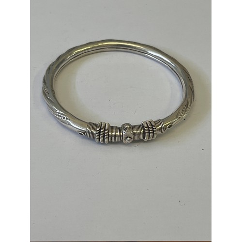 26 - 3 SILVER BANGLE BRACELETS ALL IN LOVELY INDIAN DESIGN PLUS A SILVER BANGLE  WEIGHT 67.29 GR