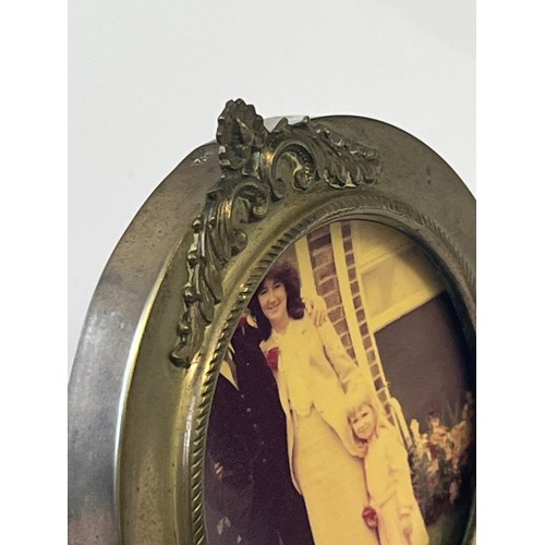 34 - A VINTAGE SILVER PHOTO FRAME