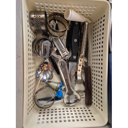 335 - 2 boxes of mixed cutlery to include an Aynsley cake slice, corkscrews, napkin rings, tongs, butter k... 