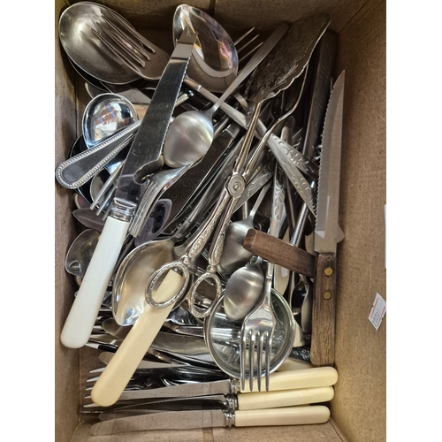 335 - 2 boxes of mixed cutlery to include an Aynsley cake slice, corkscrews, napkin rings, tongs, butter k... 