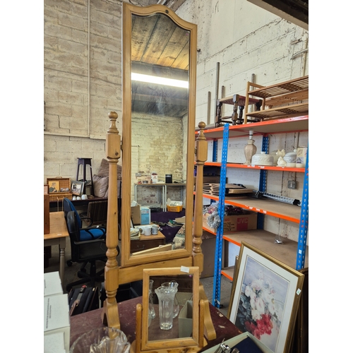 336 - A tall pine cheval mirror plus a smaller matching dressing table mirror