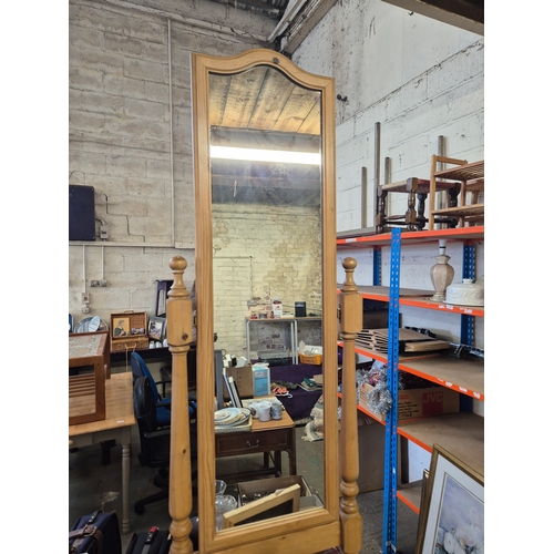 336 - A tall pine cheval mirror plus a smaller matching dressing table mirror