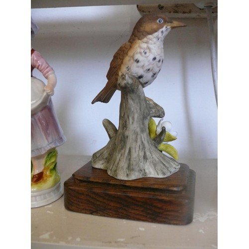 75 - Hertwig Katzhutte porcelain deer and fawn figure plus a lady and goose figure and a Song Thrush