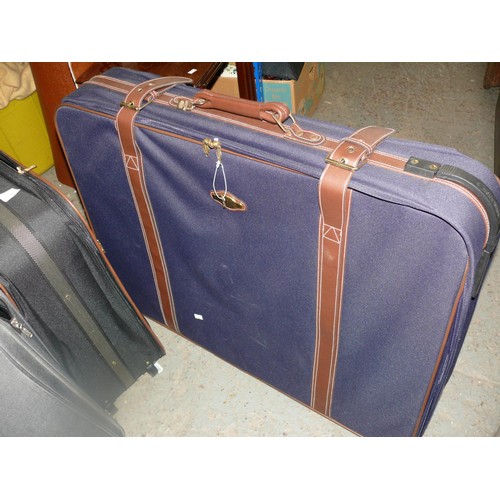 230 - 5 Large suitcases