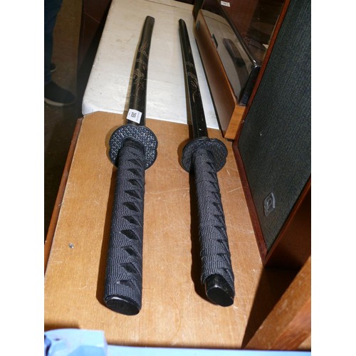A pair of Japanese Katana Samurai Kendo wooden training sticks