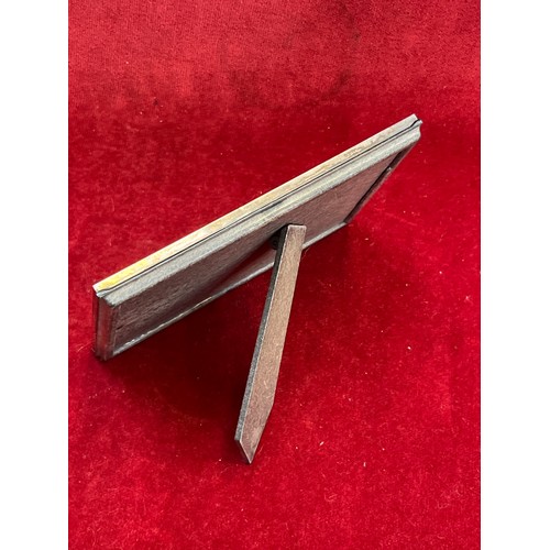 10 - Small 925 silver photograph frame, chased with classical scrolls and London import hallmarks on the ... 