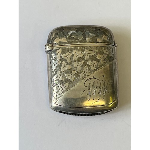 16 - Victorian sterling silver vesta case, chased and engraved on both sides with three leaf decoration, ... 