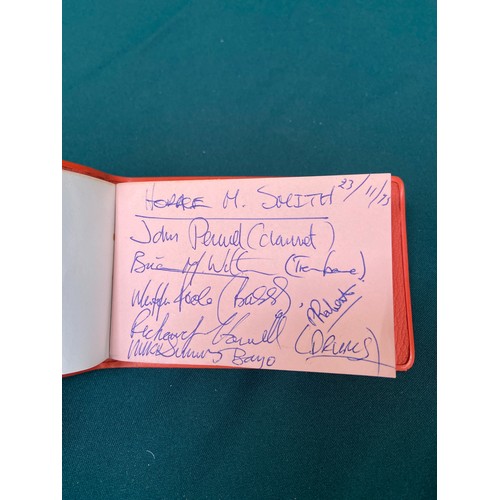 19 - Small vintage autograph book with a variety of signatures, most notably including Leslie Crowther, a... 