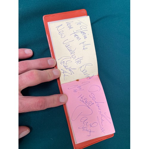 19 - Small vintage autograph book with a variety of signatures, most notably including Leslie Crowther, a... 