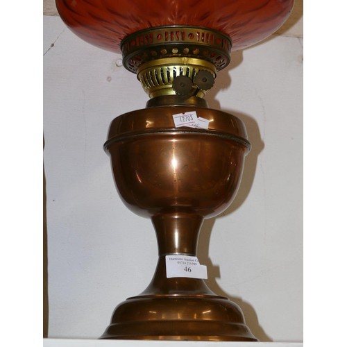 46 - ANTIQUE COPPER AND BRASS DUPLEX OIL LAMP, WITH ROSE COLOURED SHADE AND GLASS CHIMNEY.