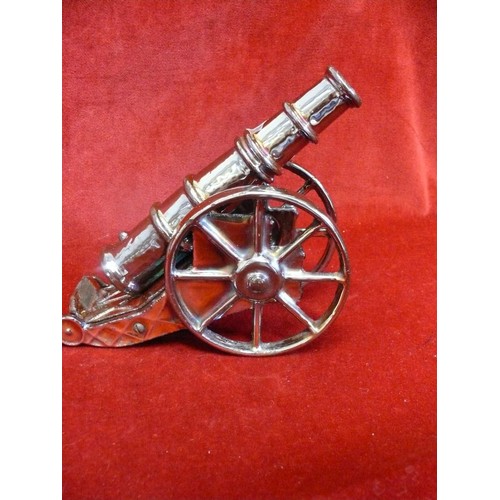 6 - CAST METAL CANNON POKER STAND. REG DESIGN 889857.