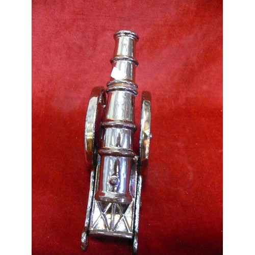 6 - CAST METAL CANNON POKER STAND. REG DESIGN 889857.
