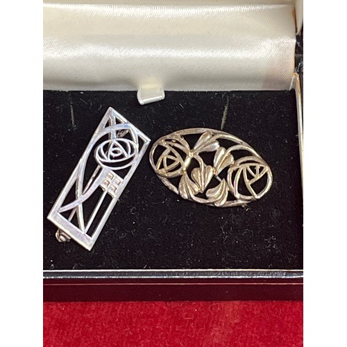 20 - Two sterling silver brooches from the Rennie Mackintosh collection, the oval one hallmarked Edinburg... 