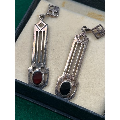 42 - Pair of sterling silver Rennie Mackintosh (Glasgow School) earrings set with oval carnelian cabochon... 