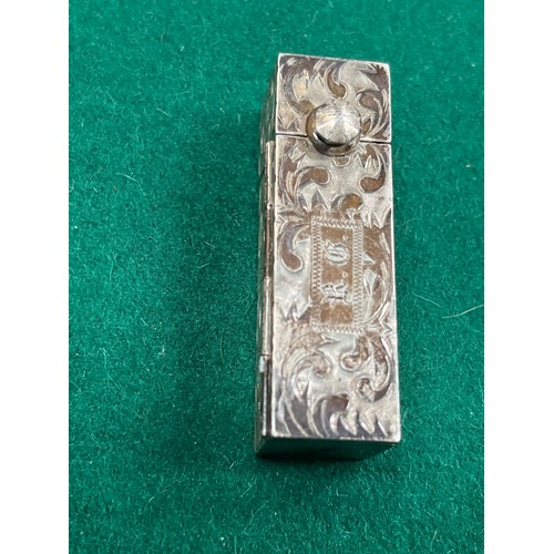 39 - Sterling silver lipstick compact with mirror. Engraved with foliate design and monogram 