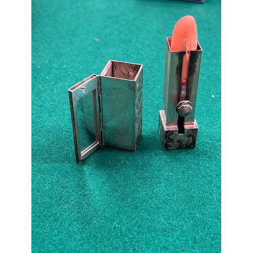 39 - Sterling silver lipstick compact with mirror. Engraved with foliate design and monogram 