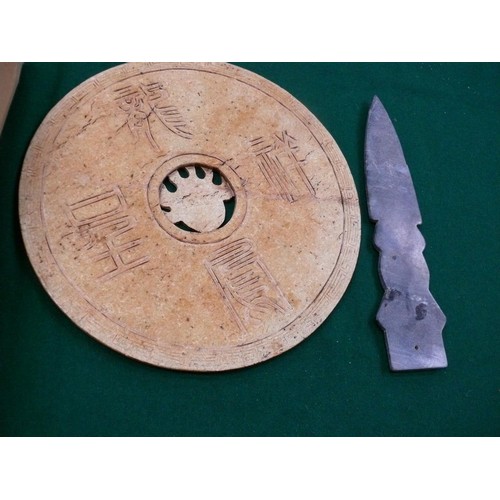 57 - A large Chinese stone disc (26cm dia) depicting a dragon and a phoenix - in Chinese culture depicts ... 