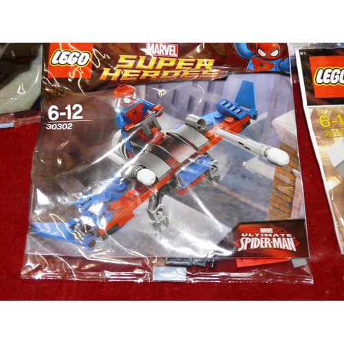 6 Lego Super Heroes kits, sealed in packets