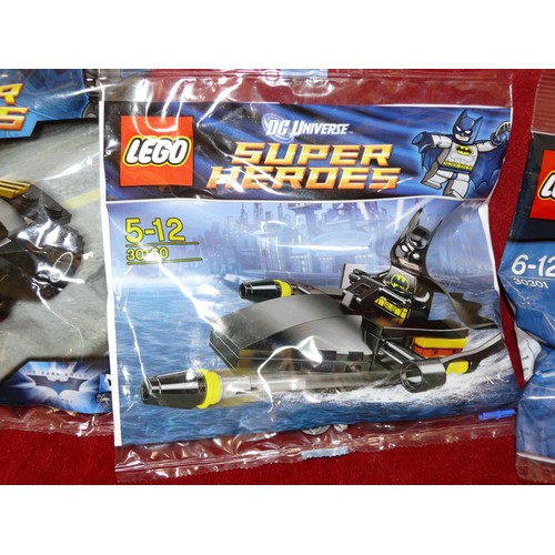 6 Lego Super Heroes kits, sealed in packets