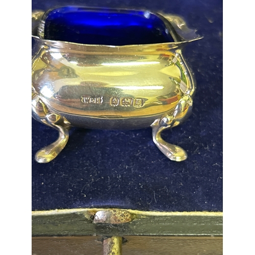 23 - A very good Sterling silver cased condiment set by  Walker & Hall, comprising 2 mustard pots with bl... 