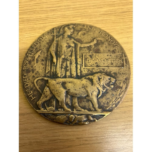 80 - A WW1 Memorial Plaque or “Death Penny” awarded to Thomas Metten
