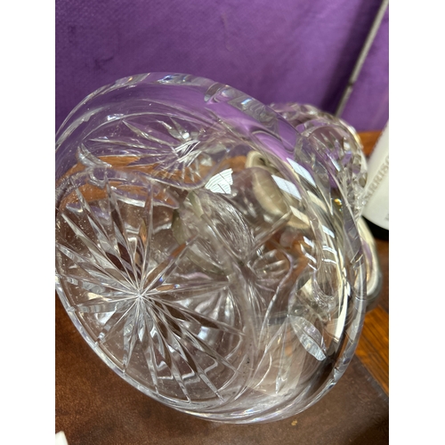 29 - A large & heavy West German cut glass & silver plated wine jug with glass liner for ice. The thumb p... 