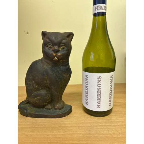 1 - An Antique Cast Iron cat door stop, with traces of original paint to the face. 22cm h