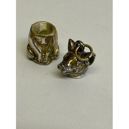 34 - A sterling silver pig pill box with screw top lid, can be worn as a pendant. Hallmarked London 1999.... 