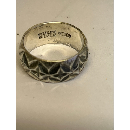 45 - 3 Sterling silver vintage rings, including a flush mounted ring with garnet (size L) a crossover rin... 