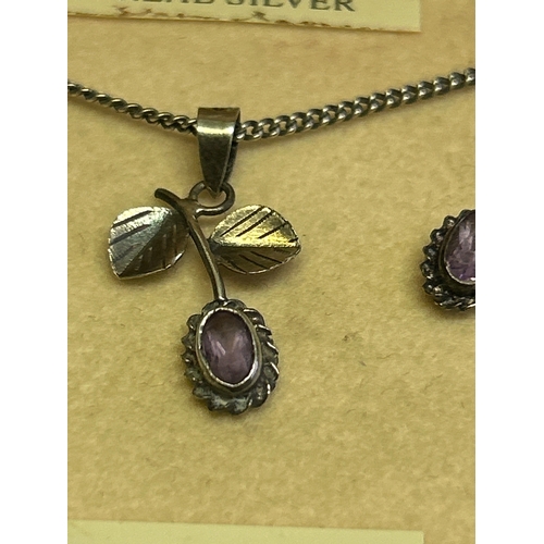 46 - A vintage Sterling silver and real amethyst necklace & earrings set, the pendant in the style of a f... 
