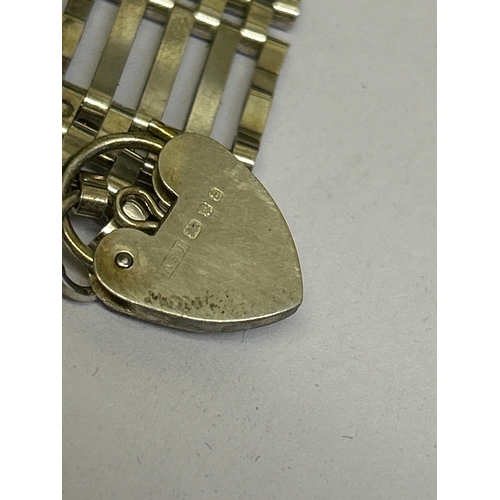 47 - Sterling silver gate bracelet with padlock heart clasp, hallmarked London 1979. 17 grams
