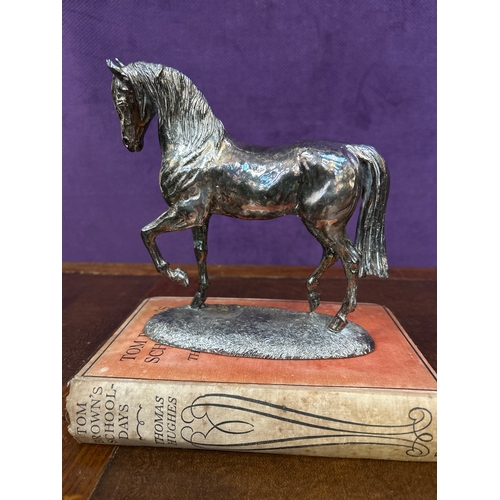 38 - A Sterling Silver figure of a horse, hallmarked Sheffield 1994 “Filled”. 17cm x 18cm. Gross weight 6... 
