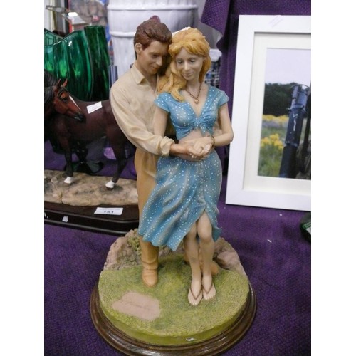 Figurine of a couple signed George Bateman Hooker