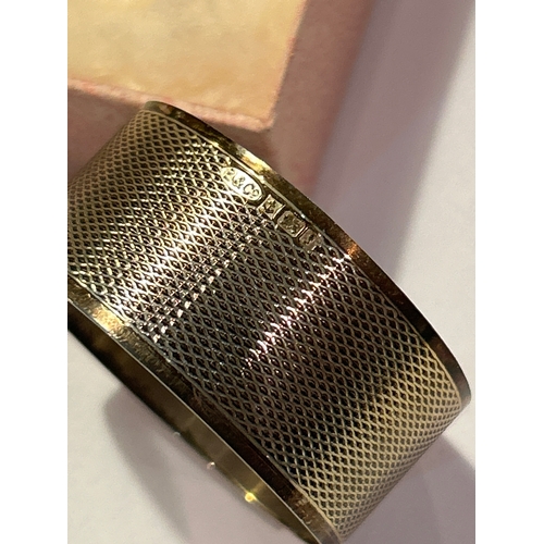 14 - Sterling silver napkin ring with engine turned finish, monogram “EAM”, 16 grams