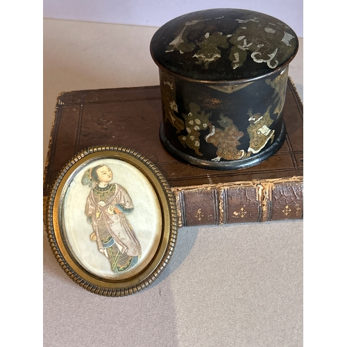 103 - A 19th Century papier mache powder box decorated with a Chinoiserie design and also an antique ormol... 