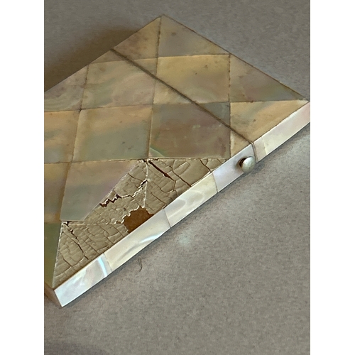 13 - A 19th Century card case covered with mother of pearl and with a silver star panel with engraved mon... 