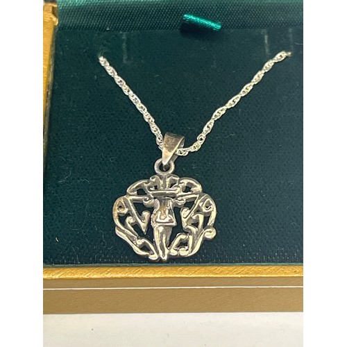28 - 2 SOLID SILVER PENDANTS OF CELTIC DESIGNS ON SILVER CHAINS