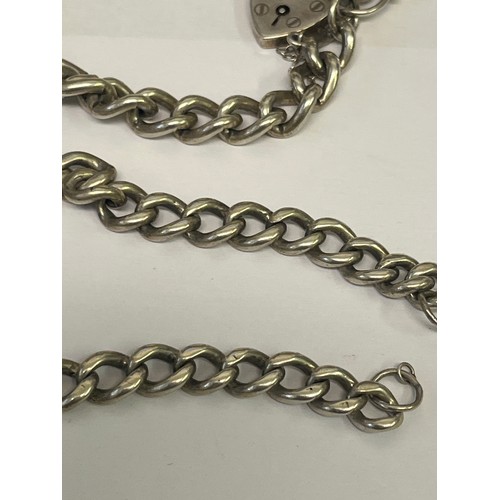41 - TWO HEAVY SOLID SILVER CHAIN BRACELETS  WITH PADLOCK WEIGHT 54GR