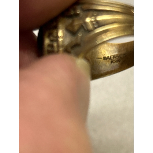 97 - A rare American “Balfour” ring, in 10K gold with green cabochon crystal and crest for Queens College... 