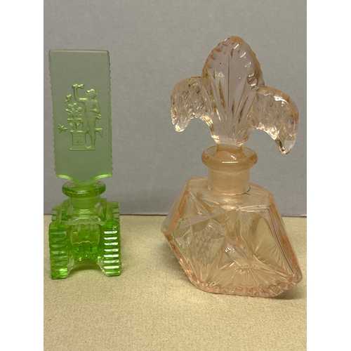 100 - Two Art Deco glass scent bottles, the green one with intaglio design probably by Heinrich Hoffmann