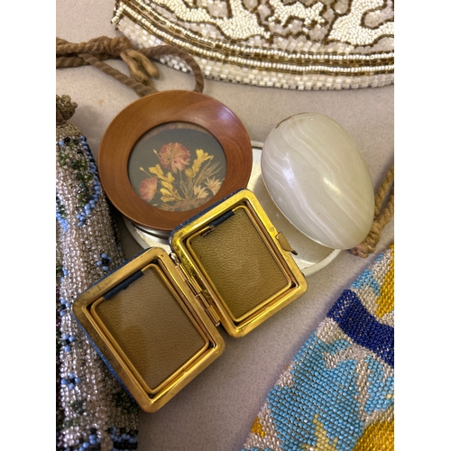 117 - A decorative lot to include Edwardian & 1920’s beadwork evening bags, a sterling silver pill box, a ... 
