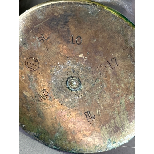 129 - Two WW1 trench art shell case vases dated 1917 and a bullet handled paper knife with punched inscrip... 