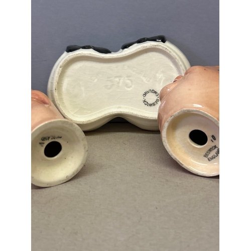 3 - A Beswick Laurel & Hardy salt & pepper cruet on stand. Printed & impressed marks.