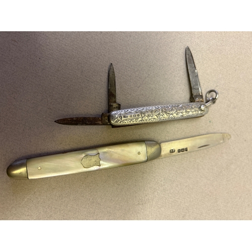 124 - A sterling silver penknife hallmarked Birm 1900 and  another fruit knife in Mother of Pearl with sil... 