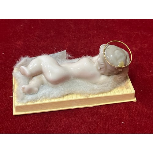 30 - A LLADRO FIGURE OF AN INNOCENT  BABY SLEEPING